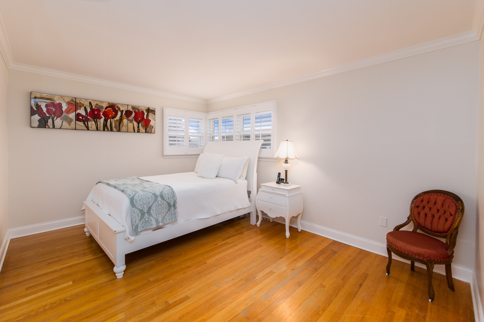 1026 Fortuna Avenue Park Ridge, IL 60068 - Photo 19 of 43 a bedroom with a bed and a chair