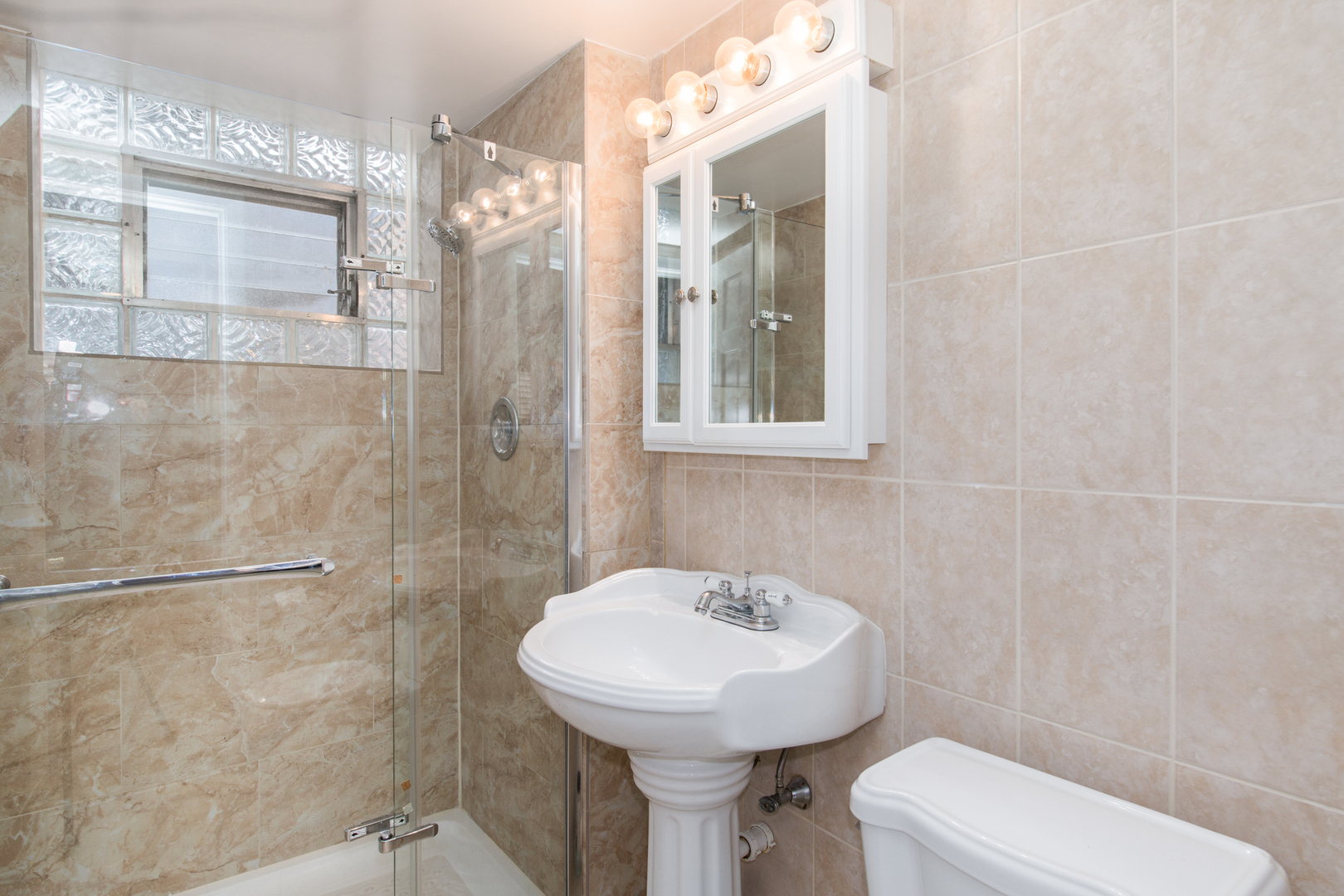 1026 Fortuna Avenue Park Ridge, IL 60068 - Photo 23 of 43 a bathroom with a sink toilet and shower