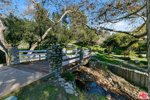 a view of a lake view with a garden
