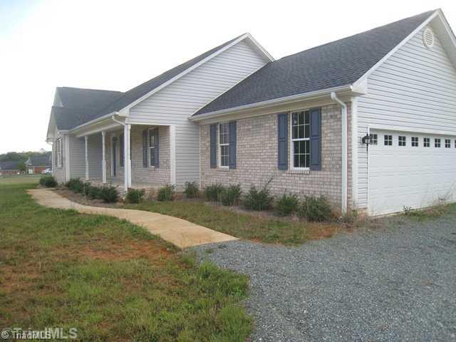 3435 Boywood Road Graham, NC 27253 - Photo 2 of 16 Exterior Front. Side-Load 2 Car Garage