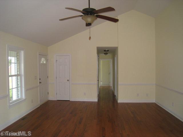 3435 Boywood Road Graham, NC 27253 - Photo 9 of 16 Living Room. Vaulted Ceiling, Oil-rubbed Bronze Fixtures