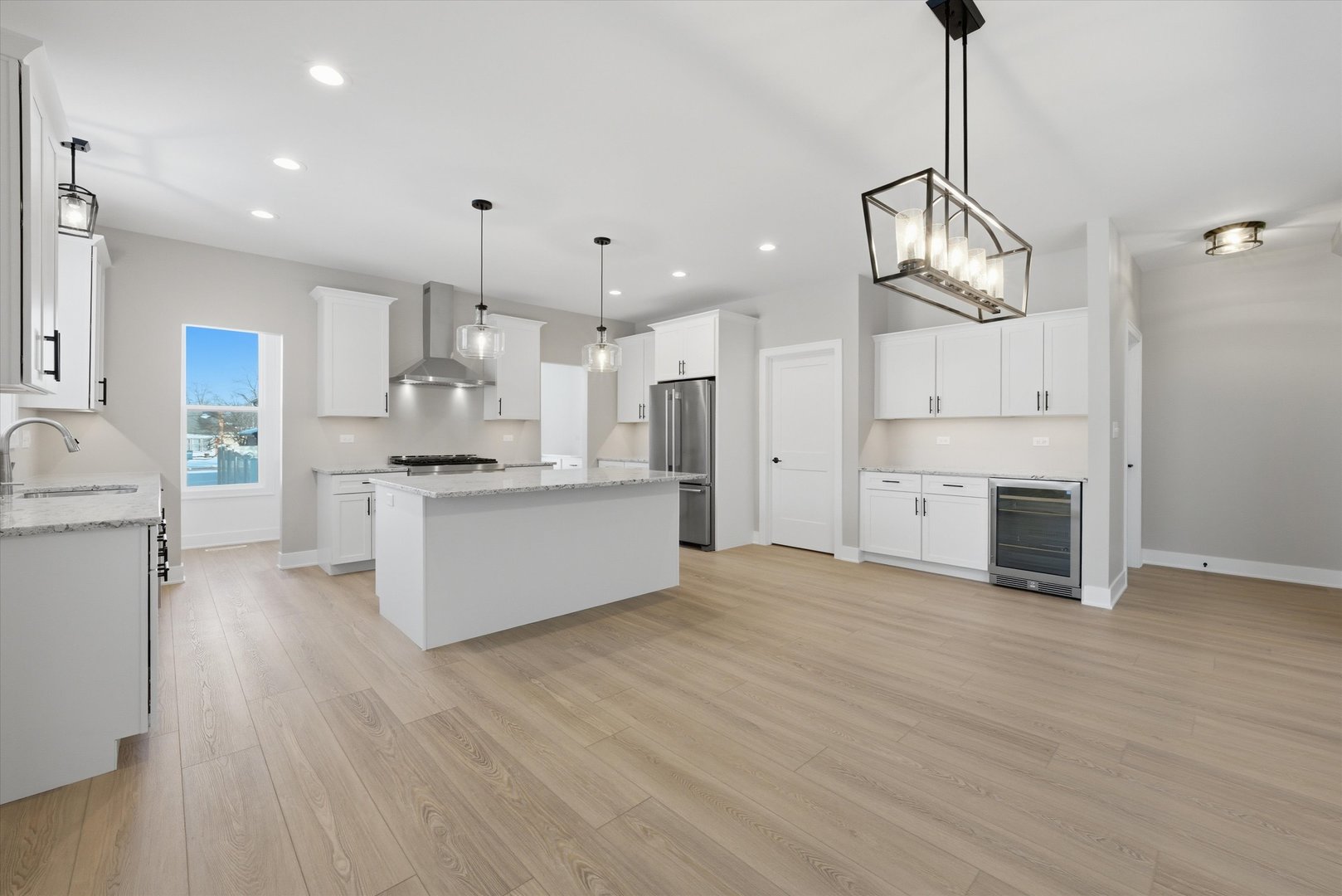 24372 Liberty Street Crete, IL 60417 - Photo 2 of 15 a view of kitchen and kitchen with wooden floor