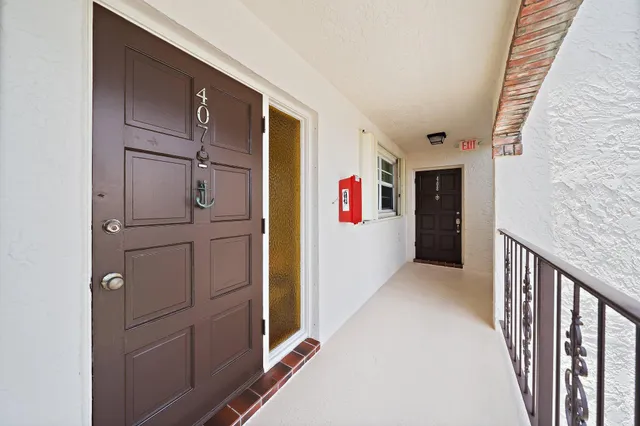 a kitchen with stainless steel appliances a stove and a microwave
