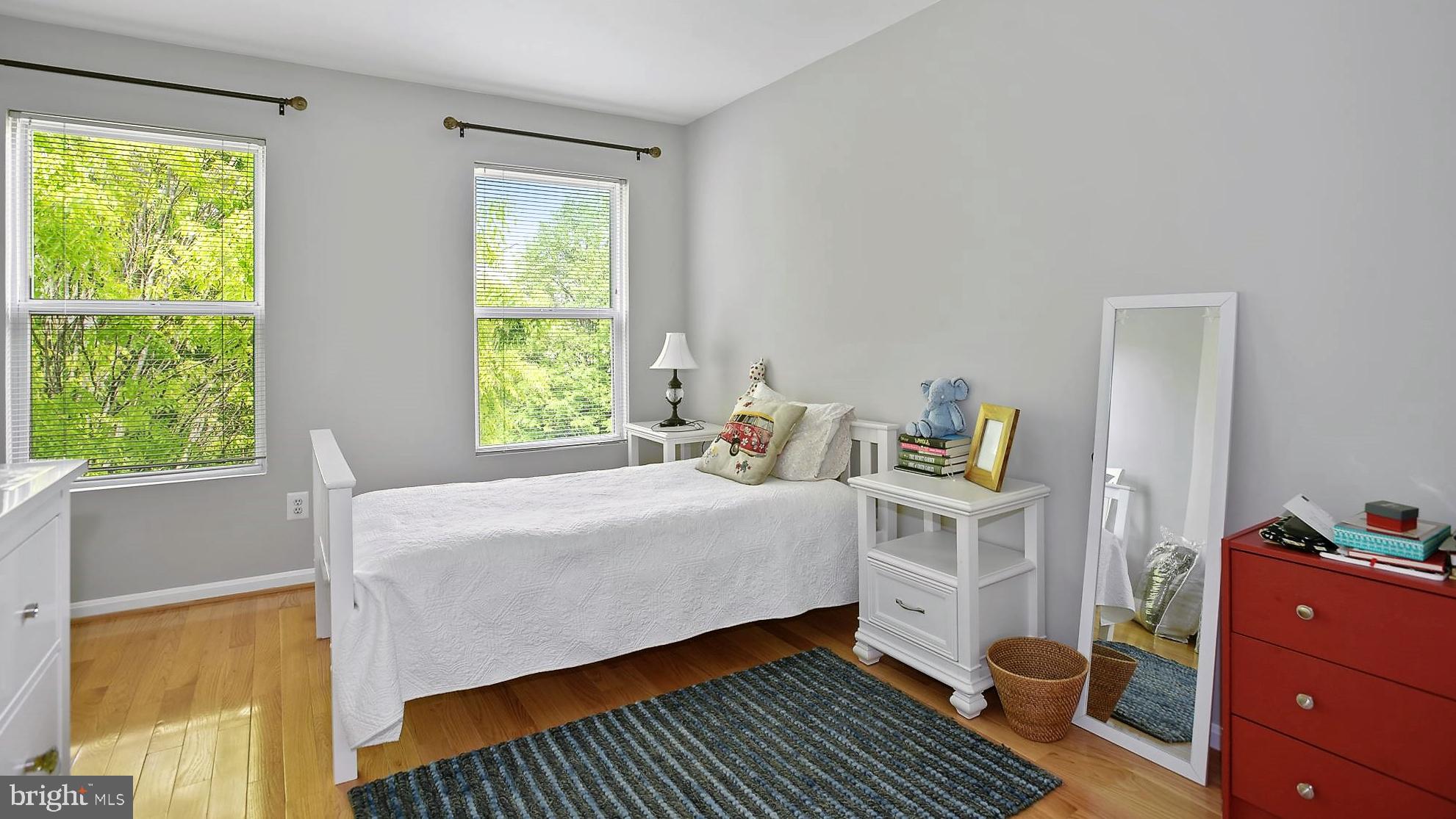 12062 Edgemere Circle Reston, VA 20190 - Photo 17 of 29 a bed room with a bed and a window