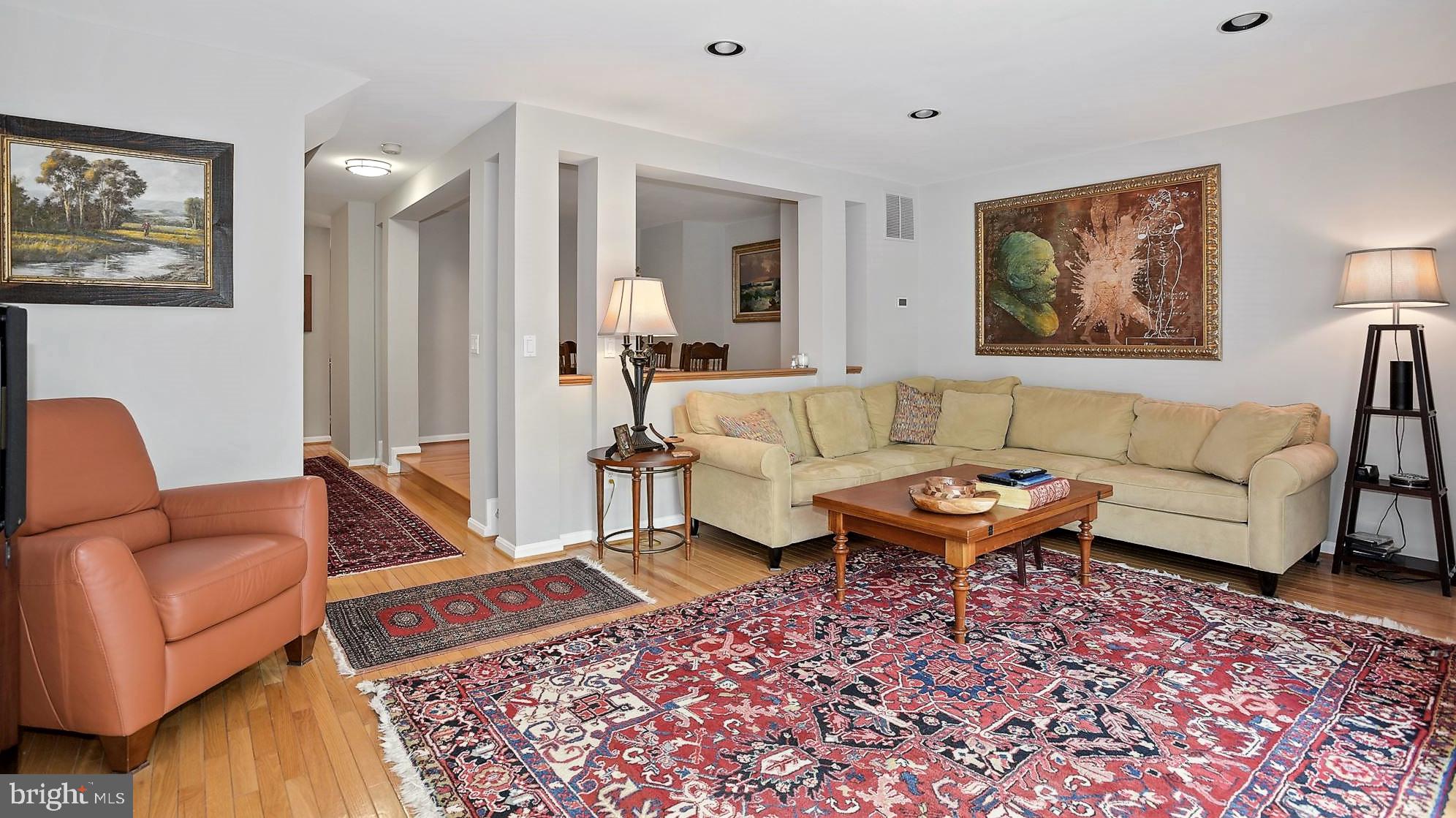 12062 Edgemere Circle Reston, VA 20190 - Photo 7 of 29 a living room with furniture and a rug