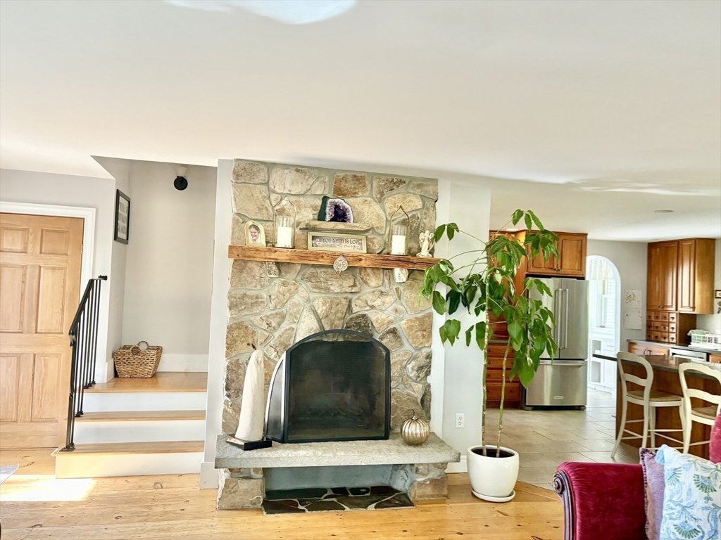 101 Russell Hill Road Ashburnham, MA 01430 - Photo 20 of 42 a living room with furniture and a fireplace