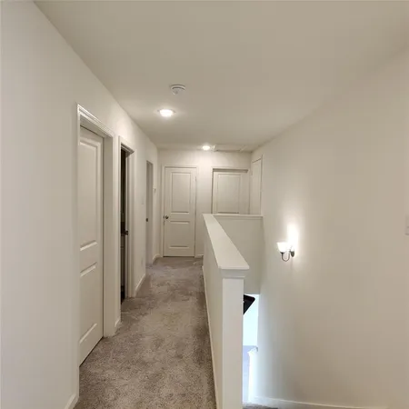 an entryway of a house with hallway