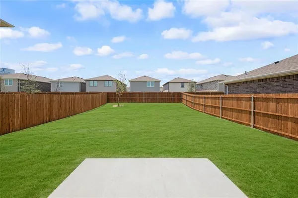 a front view of a house with yard