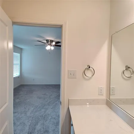 a view of a room with rack on the wall
