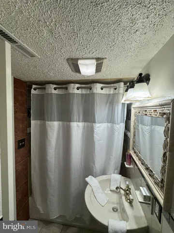 a kitchen with a stove and a refrigerator