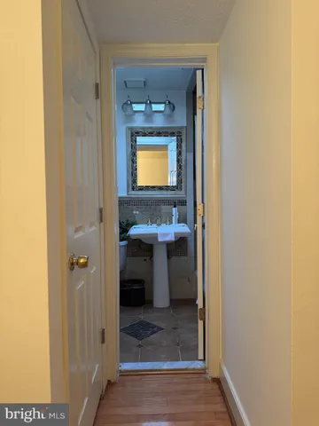 a kitchen with refrigerator and washer