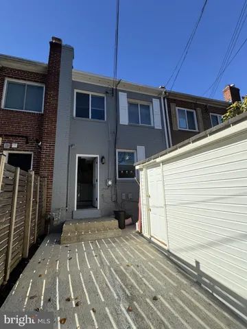 a view of a lake with wooden stairs
