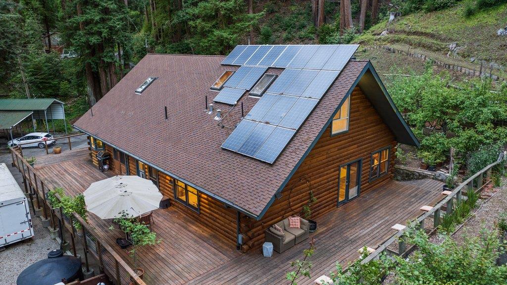 360 McGaffigan Mill Road Boulder Creek, CA 95006 - Photo 4 of 70 an aerial view of a house with table and chairs