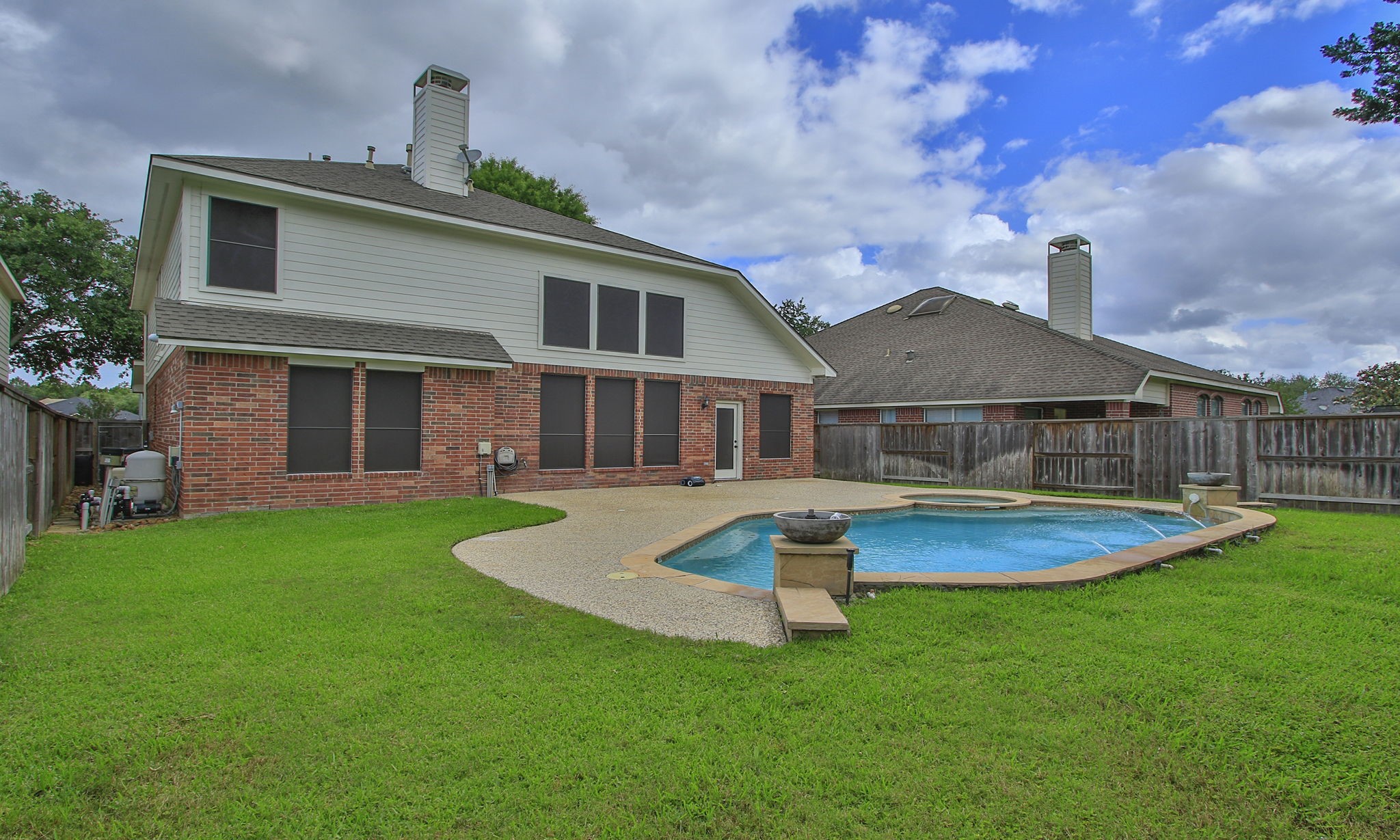 1210 Berwick Manor Court Spring, TX 77379 - Photo 47 of 50 a front view of a house with a yard