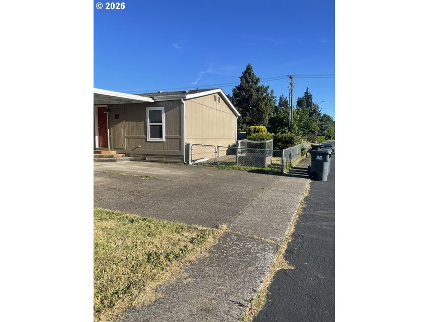 5660 Daisy Street, Unit 31 Springfield, OR 97478 - Photo 14 of 44 a view of a house with a patio