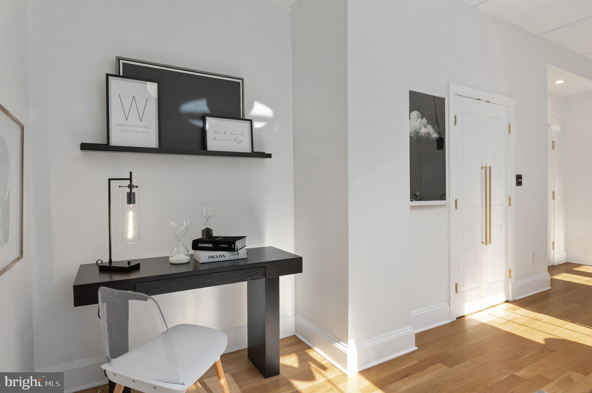 1613 Harvard Street Northwest, Unit 102 Washington, DC 20009 - Photo 15 of 27 a view of a workspace with furniture