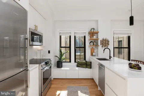 a view of living room washer and dryer