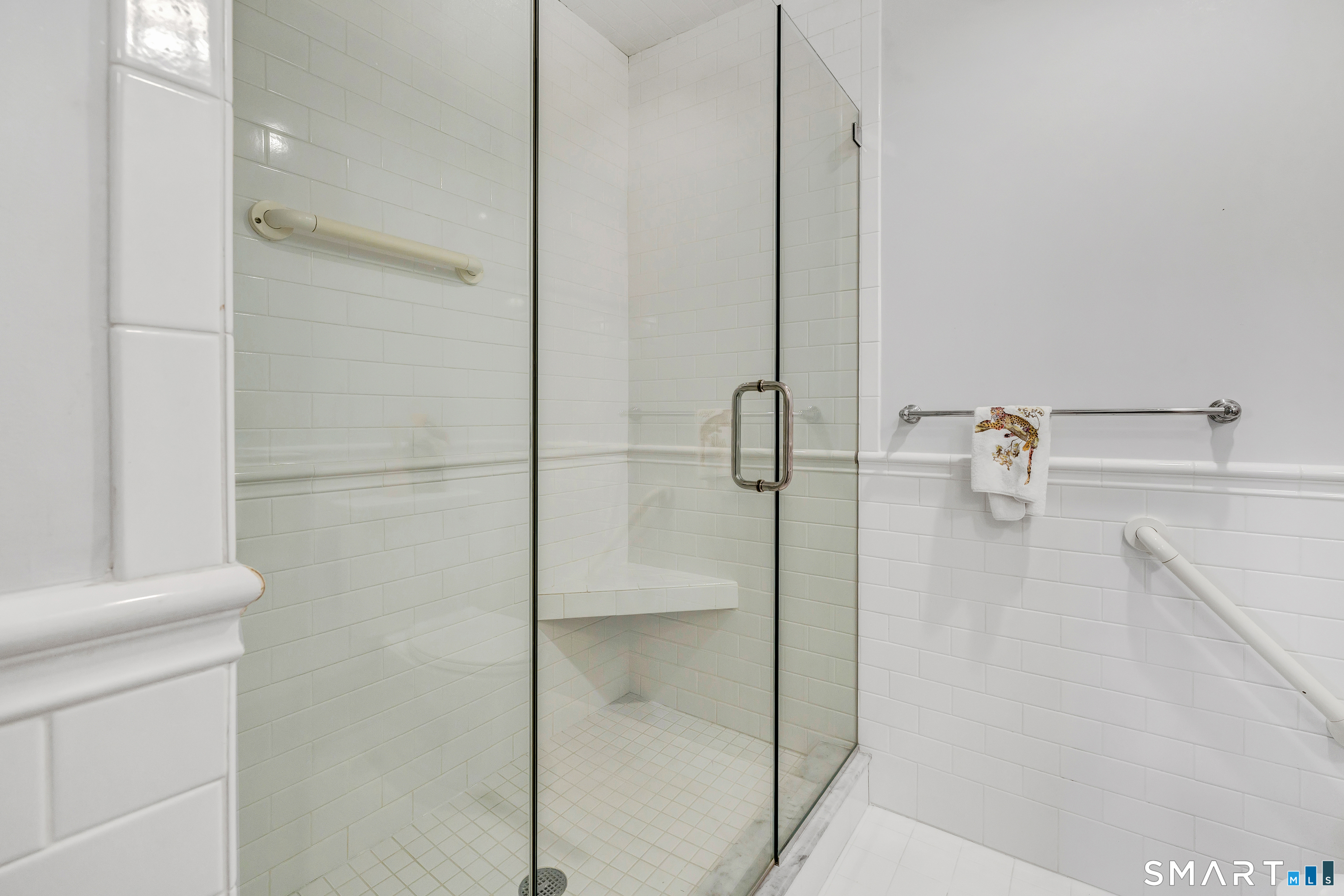 139 Field Point Drive, Unit 139 Fairfield, CT 06824 - Photo 24 of 34 a bathroom with a shower