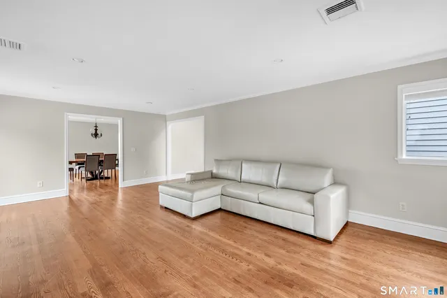 a view of a backyard with sitting area