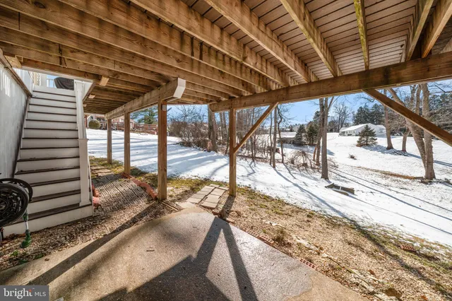 a balcony with wooden floor