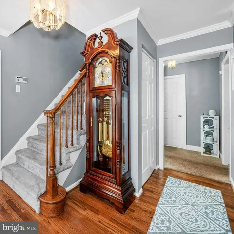 a view of entryway with wooden floor