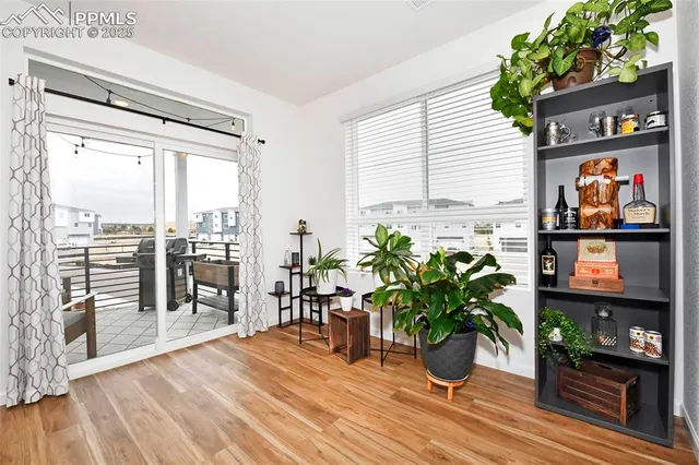 a kitchen with stainless steel appliances kitchen island granite countertop a stove and a refrigerator