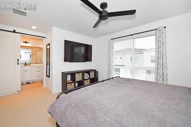 a bathroom with a double vanity sink and mirror
