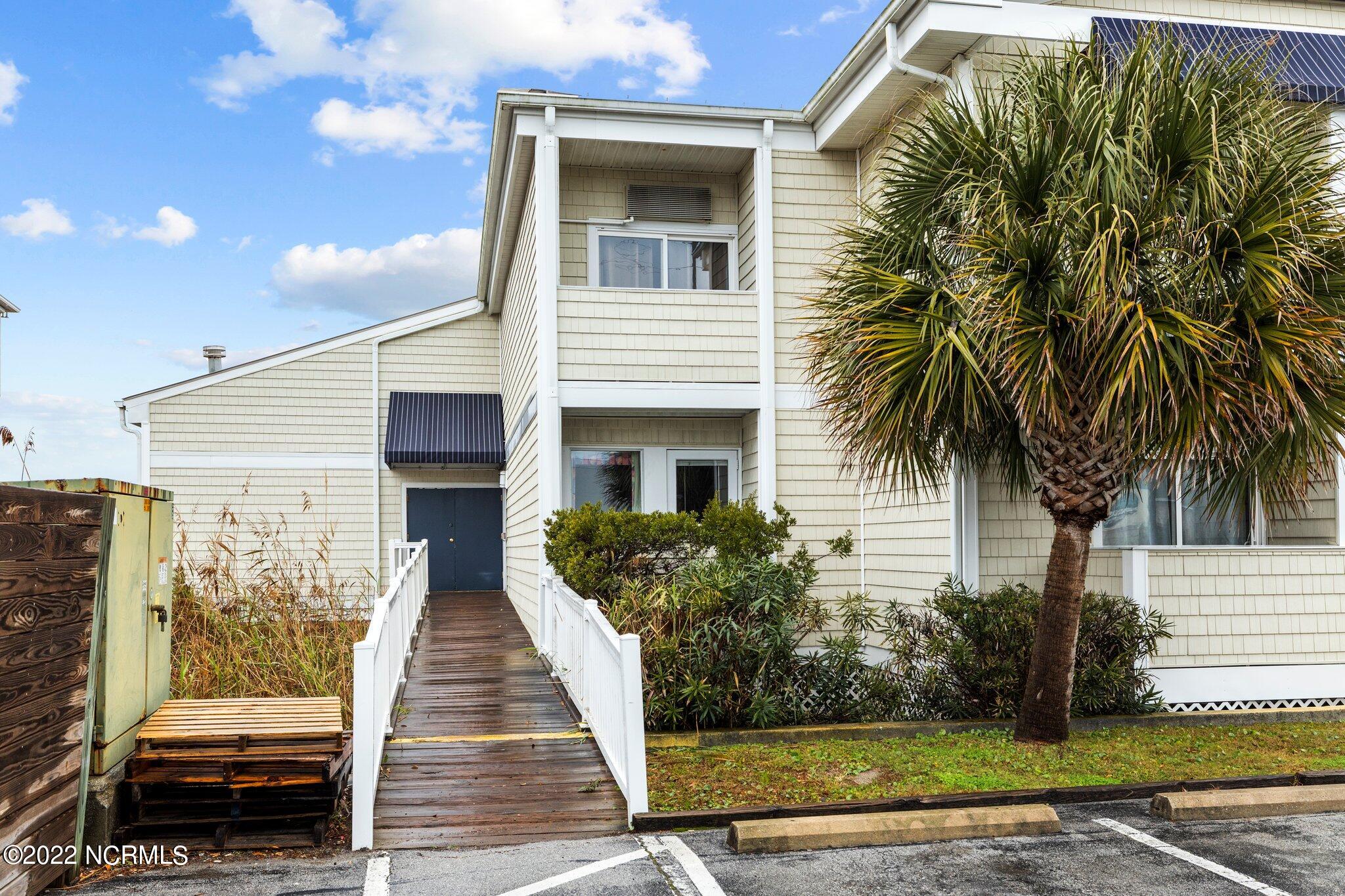 602 West Fort Macon Road, Unit 149 Atlantic Beach, NC 28512 - Photo 1 of 20 Palm Suites Exterior Elevation