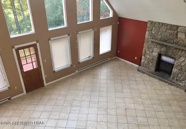 a view of a backyard with swimming pool