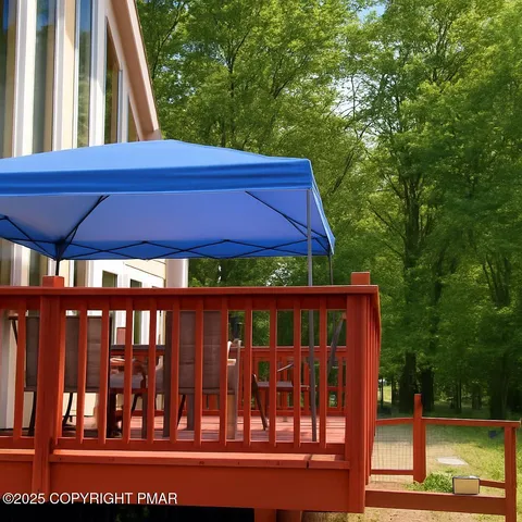 a view of porch with a yard