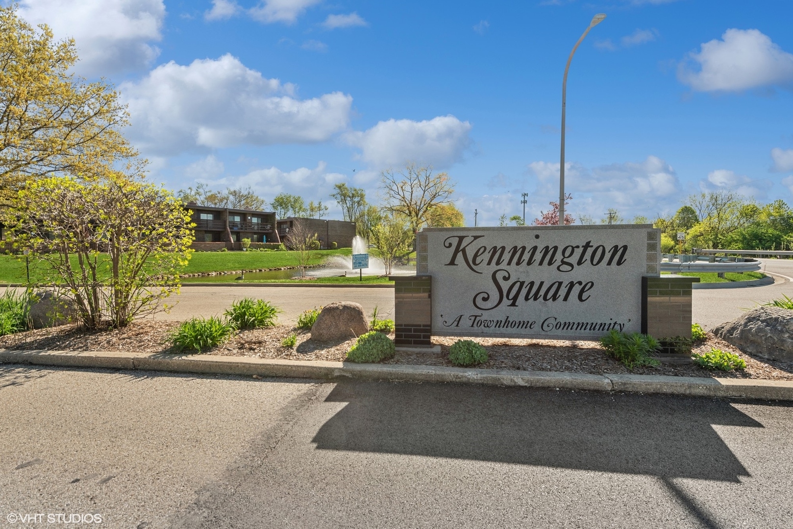 1605 Kenneth Circle, Unit 1605 Elgin, IL 60120 - Photo 11 of 12 a view of a street with sign on the side of the road