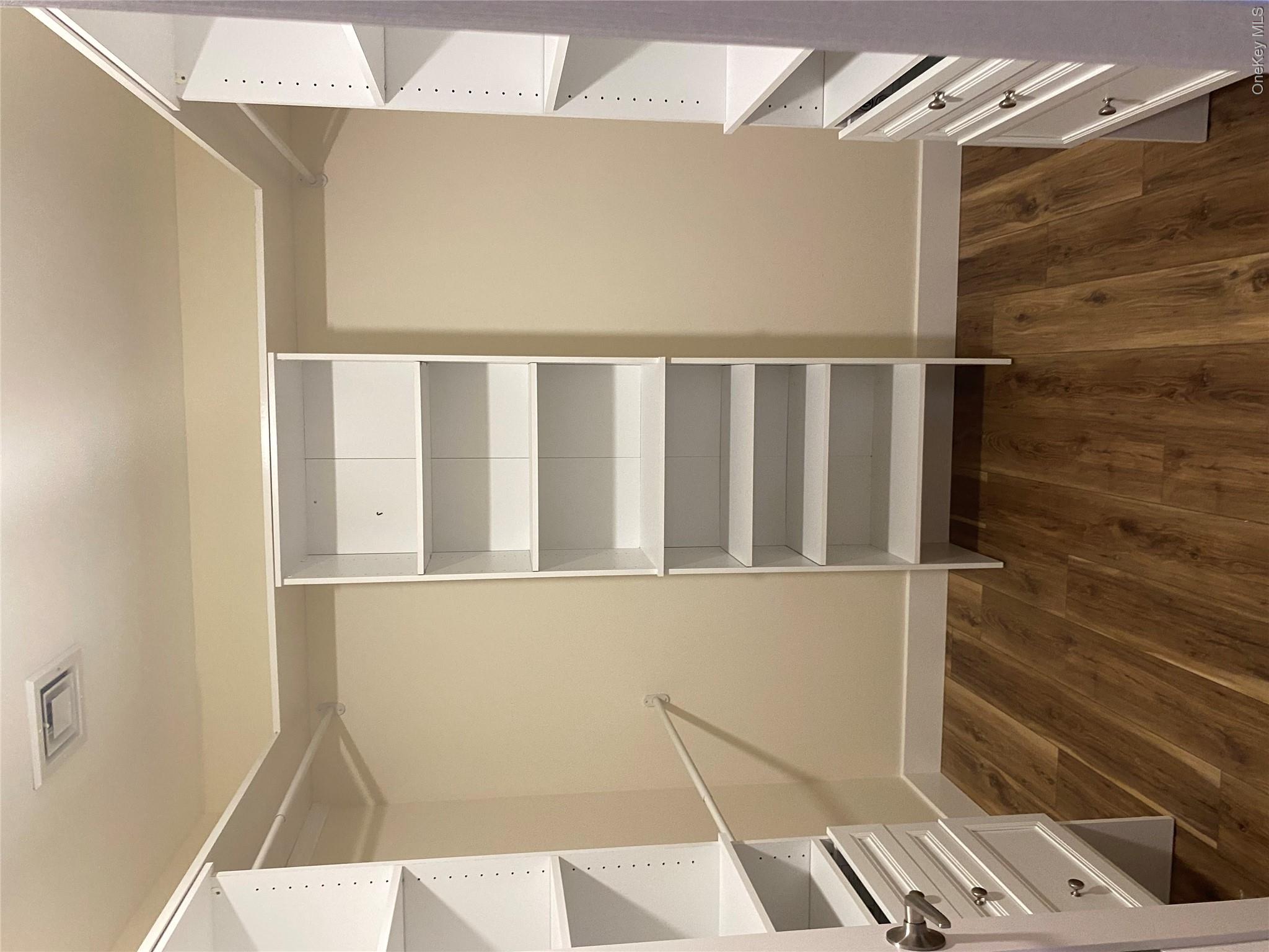 44 Roslyn Ridge Road Mongaup Valley, NY 12762 - Photo 16 of 24 Spacious closet featuring dark wood finished floors