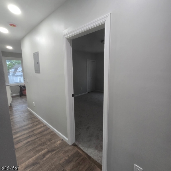 16 Baldwin Avenue, Unit 3 Newark, NJ 07108 - Photo 3 of 8 a view of hallway with wooden floor