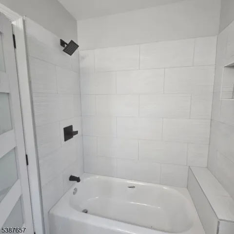a bathroom with a bathtub