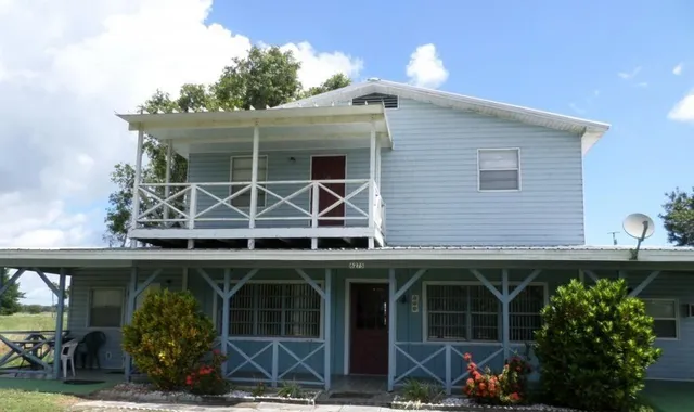 a view of house with outdoor space