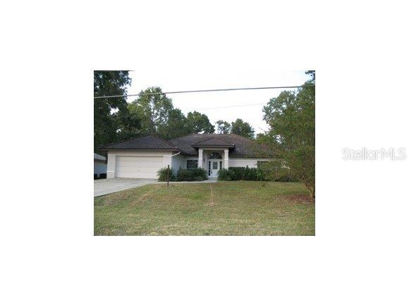 37 Almond Road Ocala, FL 34472 - Photo 1 of 1 a view of a house with a backyard
