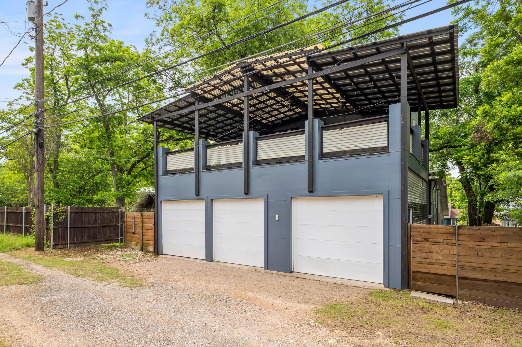 2202 Garden Street Austin, TX 78702 - Photo 5 of 37 3 car garage under B unit; current setup is 2 spaces for B unit, 1 space for A unit