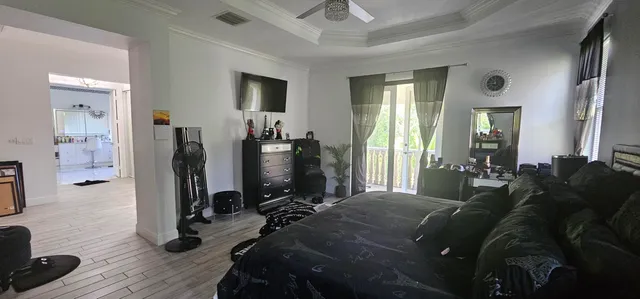a view of balcony with wooden floor and outdoor seating