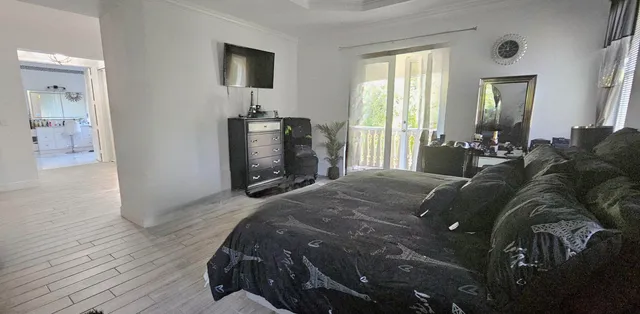 a living room with furniture and a gate