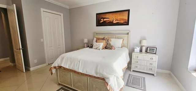 a living room with furniture a projector and a flat screen tv