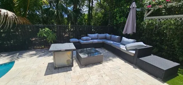 a view of a swimming pool with a patio