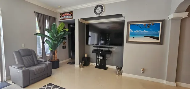 a living room with furniture and a window