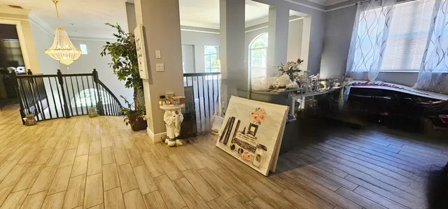 a view of entryway with wooden floor
