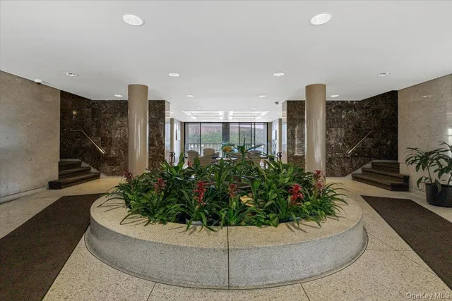 a view of a living room with furniture