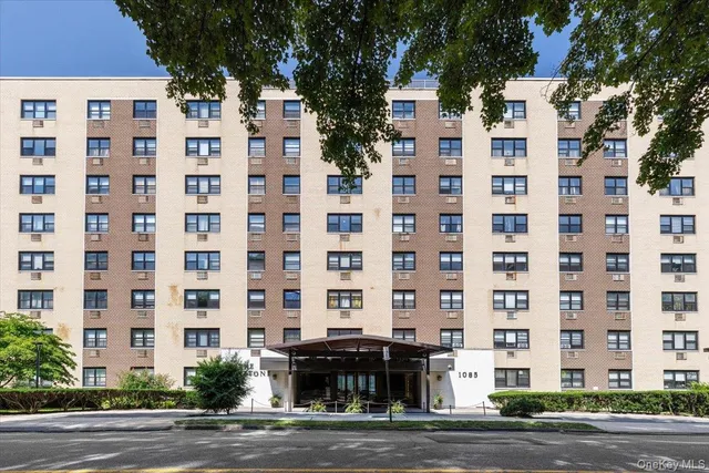 a front view of a building with a street