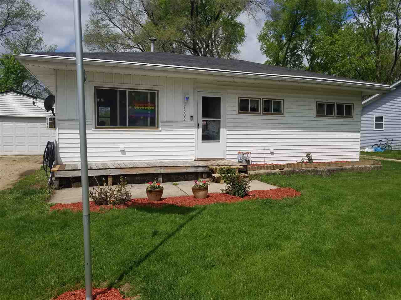 7502 Randy Road Machesney Park, IL 61115 - Photo 1 of 16 a view of a house with backyard