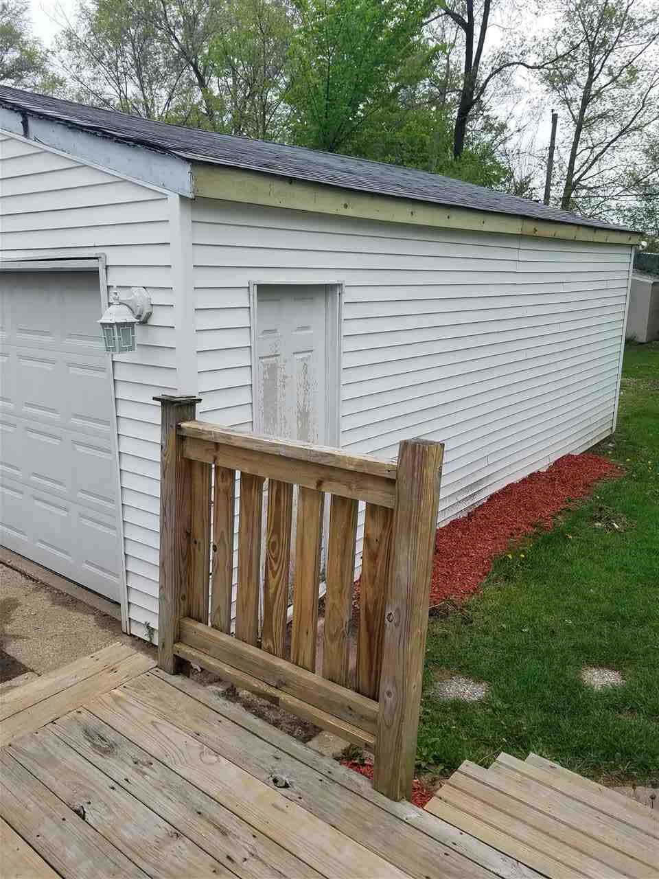 7502 Randy Road Machesney Park, IL 61115 - Photo 14 of 16 a view of backyard with deck