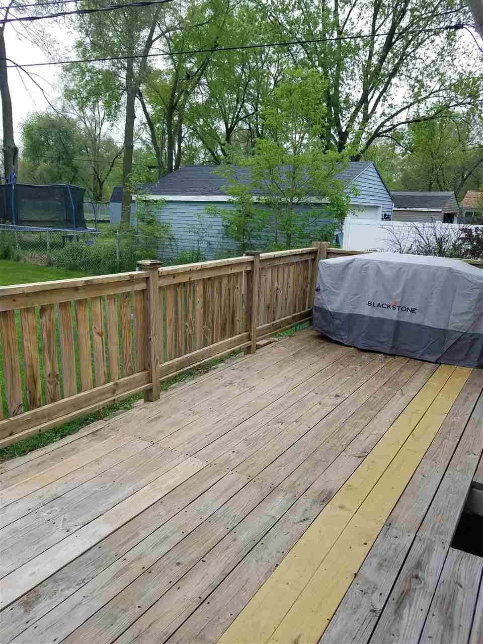 7502 Randy Road Machesney Park, IL 61115 - Photo 16 of 16 a view of a deck with a yard