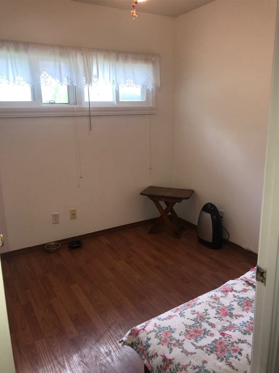 7502 Randy Road Machesney Park, IL 61115 - Photo 10 of 16 a view of an empty room and window