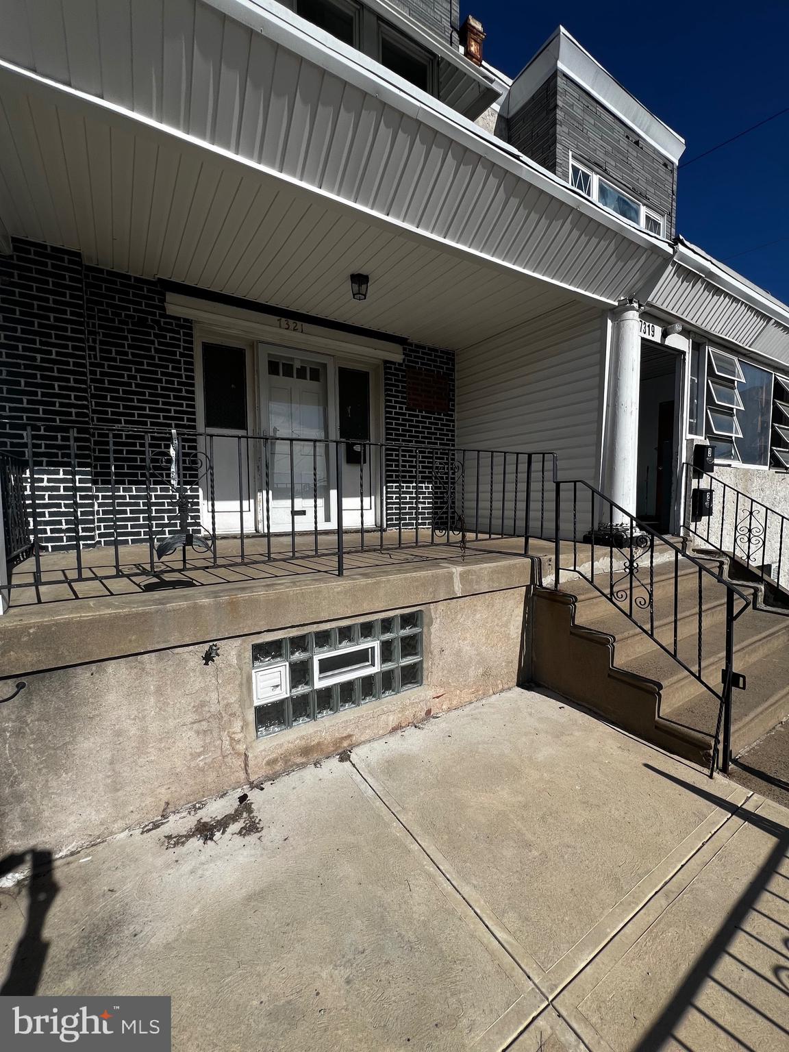 7321 Garman Street Philadelphia, PA 19153 - Photo 1 of 18 a roof deck with a table and chairs